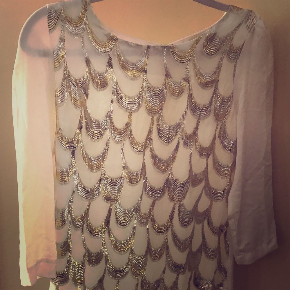 Under skies gold and silver dress